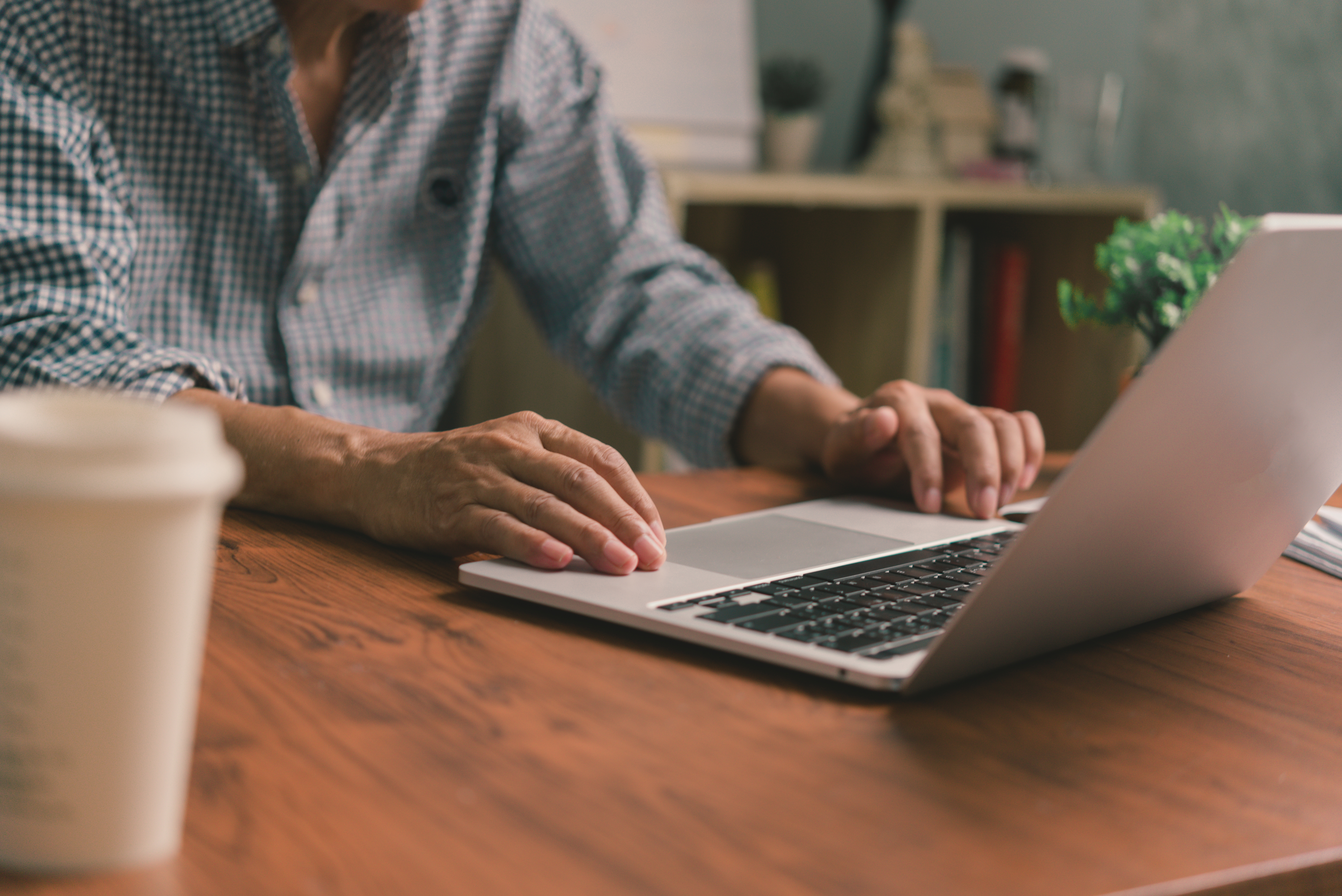 Businessperson working on a laptop