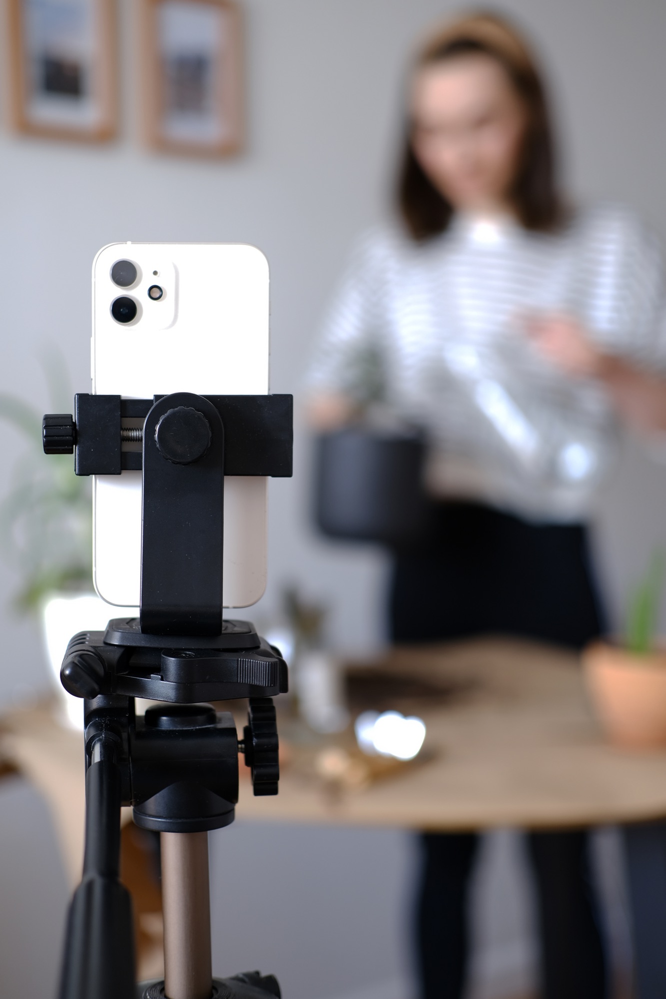 Phone on a tripod filming a creator