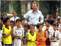 Peter Thum, co-founder of Ethos, visits children in Sumatra, Indonesia, who were getting water thanks to Ethos. (Courtesy Starbucks)