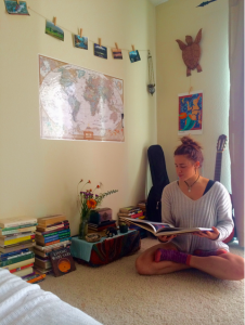 My roommate, Gianna, reading about the art of healing and modern medicine in our cozy corner of books, inspiration, & creativity.